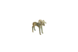 Vintage African gold weight of an impala ram with a weathered, greenish patina.