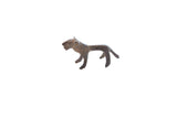 Vintage African mini lion figurine shown in profile with a dark, rustic patina.