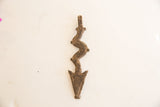 Patinated dark bronze African snake pendant, rough texture, serpentine body, arrowhead tip.