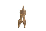 Vintage African double-headed snake pendant with an etched spiral body and aged patina.