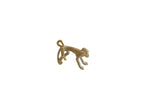 A stylized vintage African bronze monkey pendant with a rustic patina and a looped tail.