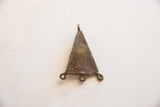 Reverse view of the triangular African bronze pendant, showing its textured patina and loops.