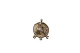 Vintage African bronze pendant with sculpted fish and turtle figures showing a natural age patina.