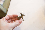 Side profile of the small vintage African Ewe impala pendant showing its scale.