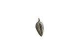 Vintage African bronze leaf pendant with etched veins and a dark, textured patina.