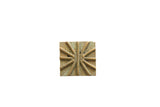 Vintage square African bronze coin with a radiating starburst design and aged patina.