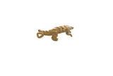 Vintage African bronze pangolin pendant with textured scales and a curled tail.