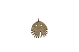 Vintage African bronze jellyfish pendant with etched surface details and an aged patina.