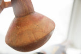 Handmade texture and historic patina on the antique North African red slip ware vase.