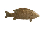 Vintage African fish sculpture with weathered bronze tone and scaled texture, 9.5 inches long.