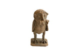 Vintage African owl with rat sculpture showing a handmade, earthy brown texture.