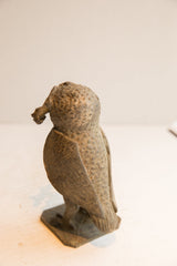Rear view of the vintage African owl sculpture highlighting the handmade pebbled texture and form.