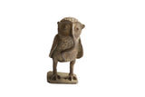 Vintage African owl with snake sculpture with a rustic, handmade texture.