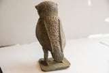 Angled back view of the vintage owl sculpture showcasing its textured body and wings.