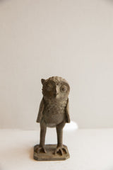 Textured, handmade head and upper body of the vintage African owl sculpture.