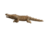 Vintage African crocodile sculpture with detailed hand-carved scales and an earthy, rustic patina.
