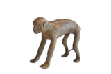 Vintage African monkey figurine with a dark, rustic finish and primitive handmade details.