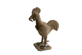 Vintage African Rooster with Worm Sculpture featuring a textured metal body and dark, aged patina.