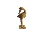 Vintage African bird sculpture with a textured body, its head turned backwards, and a small crown.
