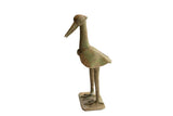 Vintage African bird sculpture with a stylized form, long neck, and weathered green patina finish.