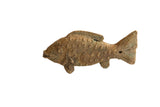Vintage African fish figurine with textured scales and an aged brown patina.