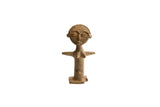 Vintage African tribal woman figurine with a weathered, handmade texture and stylized features.