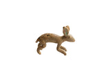 Vintage African floppy eared rabbit figurine with a rough, handmade texture and brown patina.