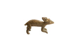 Vintage African rabbit sculpture with an imperfect, handmade form and a weathered brown patina.