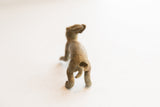 Rear view of the vintage African rabbit figurine showing its handmade form and rustic texture.