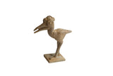 Vintage handmade African crowned bird figurine with a rustic textured surface and square base.
