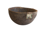 Antique African Nupe hand-carved wooden bowl, incised patterns, aged with old repairs.