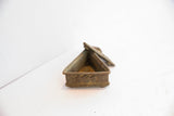 Vintage African box side, detailed with carved spiral time turner design.