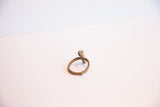 A profile view of the vintage African chameleon ring highlighting its cast bronze texture.