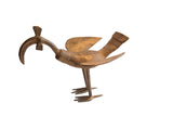 Vintage African curved beak bird casting in aged bronze, with textured body details.