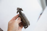 Top view of the handmade African antelope showing its textured back and patina.