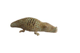 Vintage African alligator sculpture with a handmade checked pattern and aged green patina.