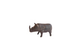 Vintage African rhino figurine with a dark, handmade patina, shown in profile.