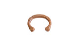 Antique African geometric copper cuff bracelet with a segmented band and stamped ends.
