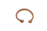 Antique African copper snake cuff bracelet with etched details and a warm, aged patina.