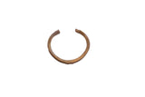 Vintage African cuff bracelet with a simple open design and warm brass patina.