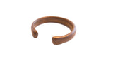 Antique African snake cuff bracelet with a simple, smooth design and warm, aged patina.