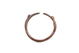 Vintage African child's bracelet with a hand-formed open cuff and time-softened patina.