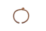 Vintage African knotted cuff bracelet with a hand-worked texture and central knot.