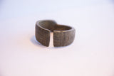 Aged patina and hand-etched details on the open ends of the vintage cuff.