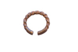 Antique African cuff bracelet featuring a twisted rope design and rich patina.