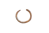 Vintage African barber pole cuff bracelet with a weathered bronze and blue time-softened patina.