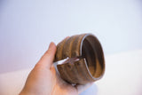 A view of the vintage African cuff bracelet's opening and thick interior.