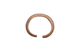 Vintage African ridged cuff bracelet with a warm bronze patina and textured, handmade details.