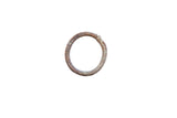 Vintage African bracelet with a rustic, circular shape and a coarse, aged patina.
