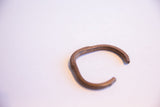 Handmade vintage copper cuff bracelet with an open shape and rustic patina.